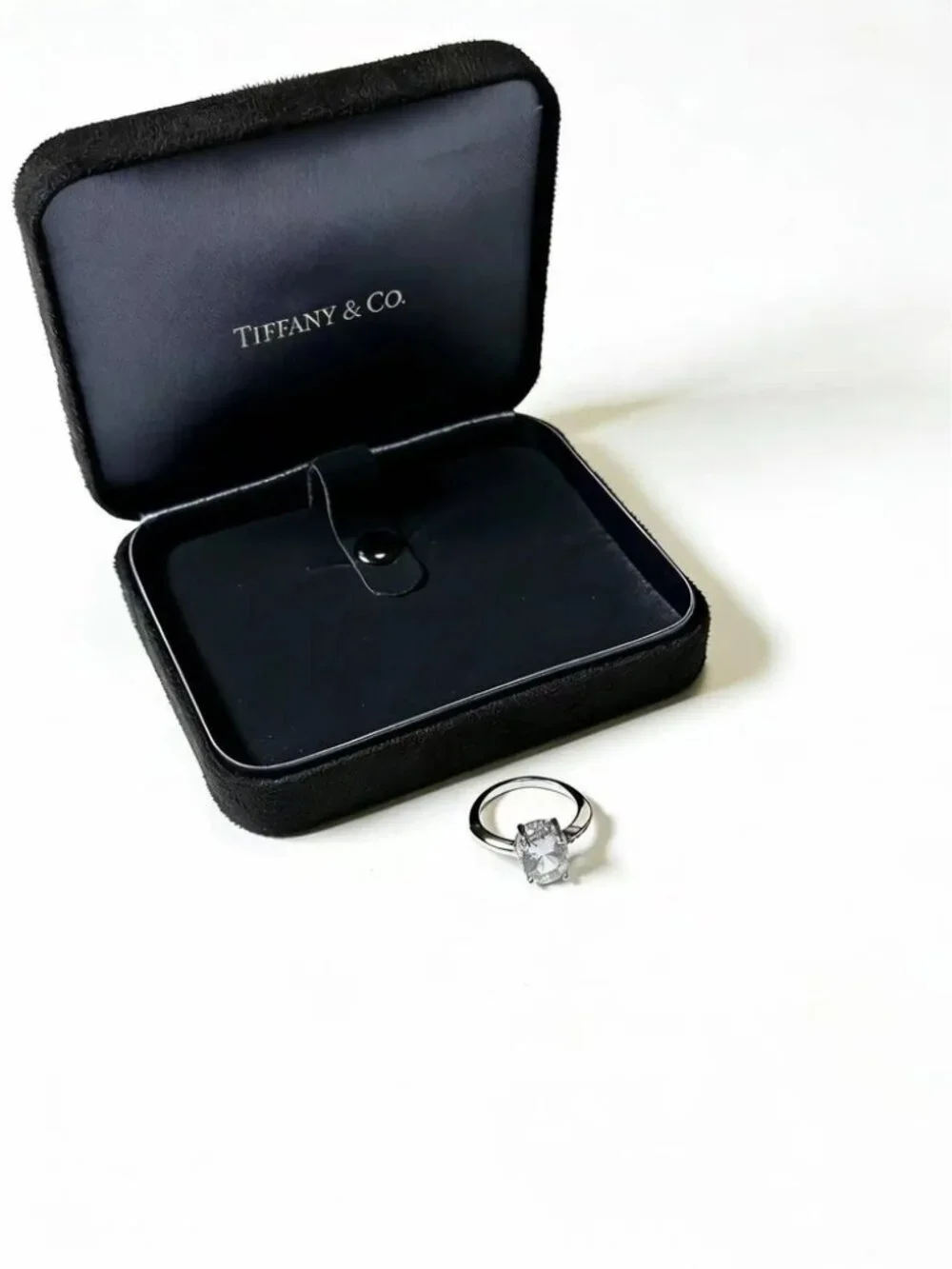 Tiffany & Co. Oval Center Stone and Side Stone Ring